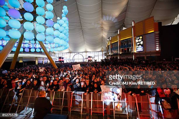 Fans wait to see Michael Jackson announce plans for Summer residency at the O2 Arena at a press conference held at the O2 Arena on March 5, 2009 in...