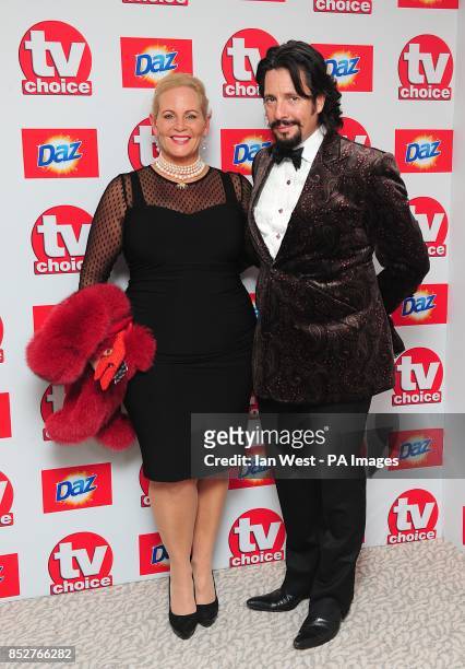 Laurence Llewelyn-Bowen and Jackie Bowen arriving for the 2013 TV Choice awards at the Dorchester Hotel, London.