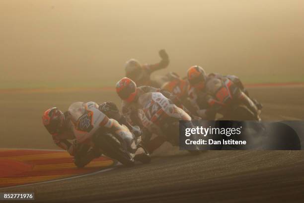 Patrik Pulkkinen of Finland and Peugeot MC Saxoprint, Tony Arbolino of Italy and SIC58 Squadra Corse, Manuel Pagliani of Italy and CIP and Bo...