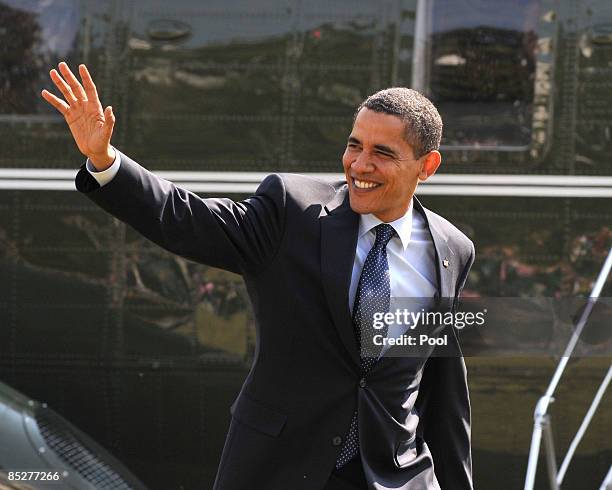 President Barack Obama waves as he arrives on the South Lawn of the White House March 6, 2009 in Washington, DC. Obama was returning after making...