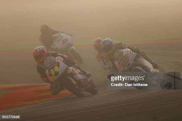 Jakub Kornfeil of the Czech Republic and Peugeot MC Saxoprint and Gabriel Rodrigo of Argentina and the RBA BOE Racing Team ride in the fog during...