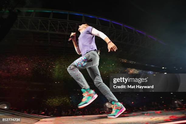 Chris Martin of Coldplay performs on stage at CenturyLink Field on September 23, 2017 in Seattle, Washington.