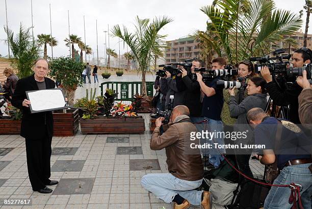 Bruno Ganz presents an impression of his hands at a photocall during the 10th Las Palmas International Cinema Festival on March 6, 2009 in Las...