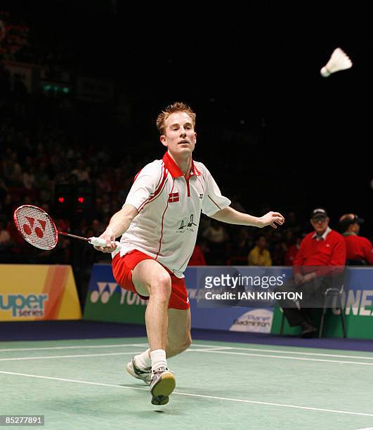 Peter Gade of Denmark plays in his men's quarter final single match against Taufik Hidayat of Indonesia during the All England Open Badminton...