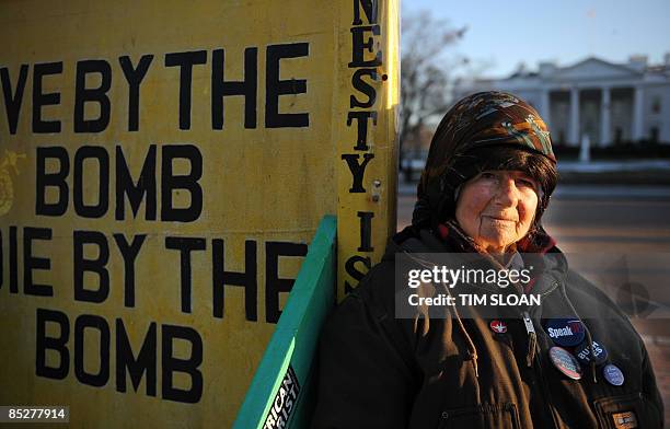 Concepcion Picciotto poses with her signs across the street from the White House March 4, 2009 in Washington, DC. Picciotto has lived in Lafayette...