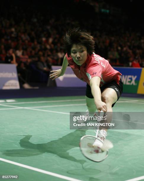 Jiang Yanjiao of China plays in her women's singles quarter final match against Lu Lan of China during All England Open Badminton Championships at...