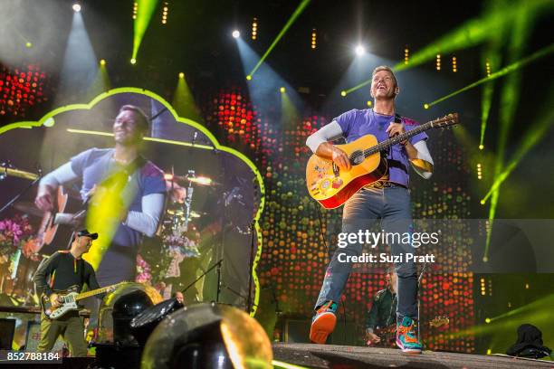 Chris Martin of Coldplay performs at CenturyLink Field on September 23, 2017 in Seattle, Washington.