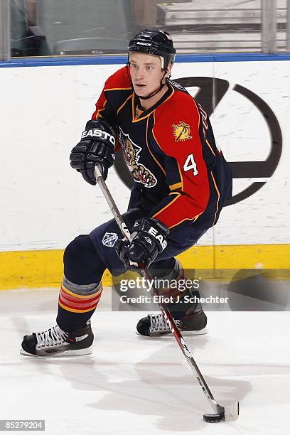 Jay Bouwmeester of the Florida Panthers skates with the puck against the Pittsburgh Penguins at the Bank Atlantic Center on March 5, 2009 in Sunrise,...