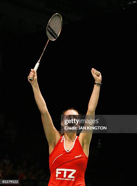 Tine Rasmussen of Denmark celebrates winning her women's singles quarter final match against Yip Pui Yin of Hong Kong during the Badminton All...