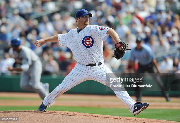 Ryan Dempster of the Chicago Cubs pitches during a Spring Training game against the Los Angeles Dodgers at HoHoKam Park on March 6, 2009 in Mesa,...