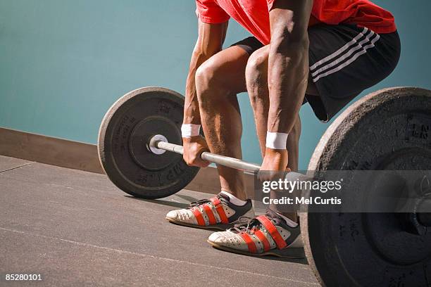 working out - lifting weights stock pictures, royalty-free photos & images