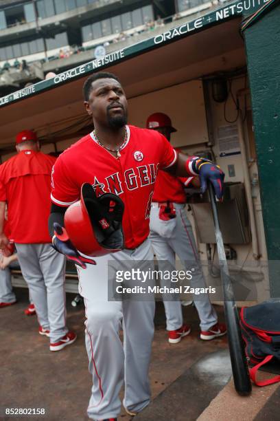 Brandon Phillips of the Los Angeles Angels of Anaheim stands in the dugout prior to the game against the Oakland Athletics at the Oakland Alameda...