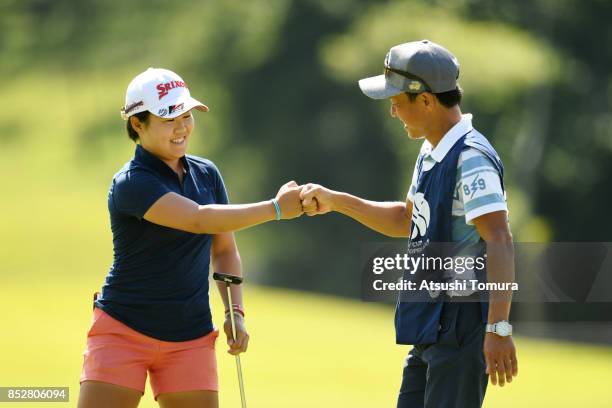 Nasa Hataoka of Japan celebrates after making her birdie putt on the 8th hole during the final round of the Miyagi TV Cup Dunlop Ladies Open 2017 at...