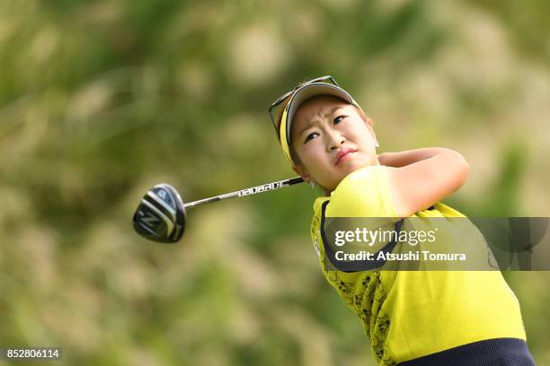 Sakura Kito of Japan hits her tee shot on the 5th hole during the final round of the Miyagi TV Cup Dunlop Ladies Open 2017 at the Rifu Golf Club on...