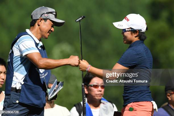 Nasa Hataoka of Japan celebrates after making her par putt on the 16th hole during the final round of the Miyagi TV Cup Dunlop Ladies Open 2017 at...