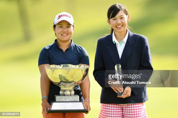 Nasa Hataoka and Kagetsu Tsuruse of Japan pose with the trophy after winning the Miyagi TV Cup Dunlop Ladies Open 2017 at the Rifu Golf Club on...