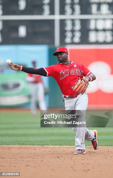 Brandon Phillips of the Los Angeles Angels of Anaheim fields during the game against the Oakland Athletics at the Oakland Alameda Coliseum on...