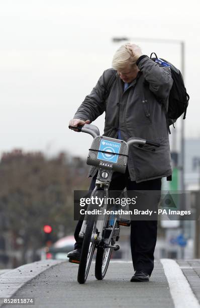 Mayor of London Boris Johnson at Wandsworth Bridge at the launch of the expansion of the Barclays Cycle Hire scheme to Wandsworth Town, south London.