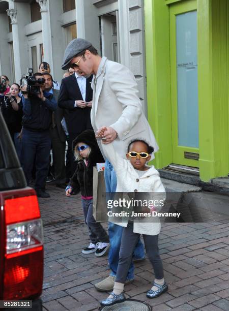 Brad Pitt, Shiloh Jolie-Pitt and Zahara Jolie-Pitt seen leaving Tugooh toy store in Washington, DC on March 6, 2009.
