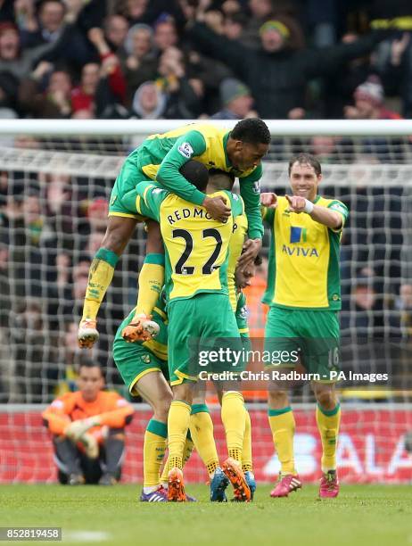 Norwich City's Gary Hooper celebrates scoring their first goal of the game with team-mates