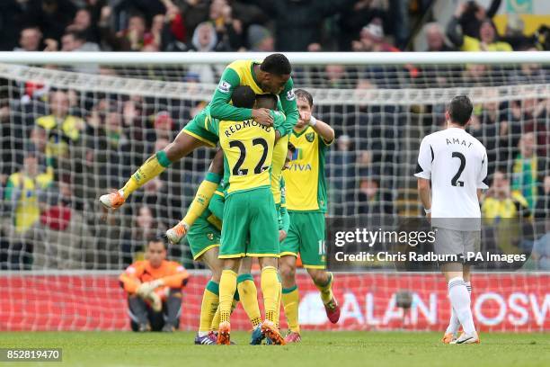 Norwich City's Gary Hooper celebrates scoring their first goal of the game with team-mates