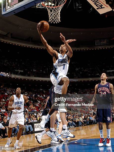 Rafer Alston of the Orlando Magic drives against the New Jersey Nets during the game on March 6, 2009 at Amway Arena in Orlando, Florida. NOTE TO...