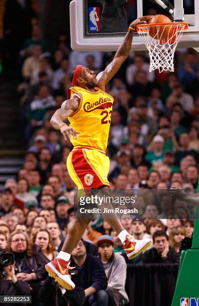 LeBron James of the Cleveland Cavaliers scores against the Boston Celtics at the TD Banknorth Garden on March 6, 2009 in Boston, Massachusetts. NOTE...