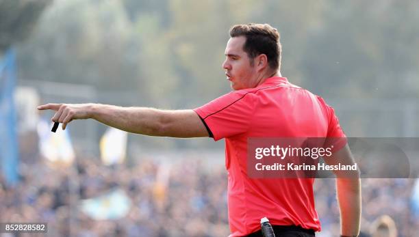 Referee Felix-Benjamin Schwermer reacts during the 3.Liga match between FC Carl Zeiss Jena and SC Preussen Muenster at Ernst-Abbe Sportfeld on...