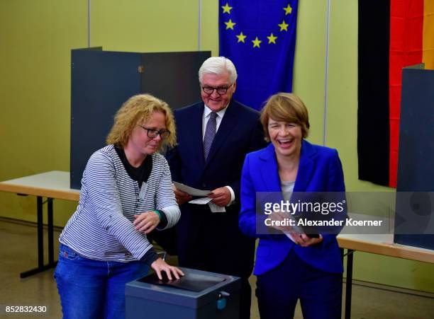 German President Frank-Walter Steinmeier and his wife Elke Buedenbender cast their ballot in German federal elections on September 24, 2017 in...