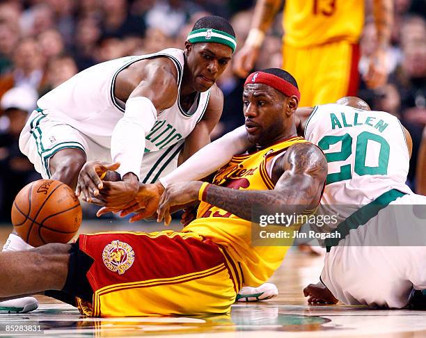 LeBron James of the Cleveland Cavaliers battles Rajon Rondo of the Boston Celtics at the TD Banknorth Garden on March 6, 2009 in Boston,...