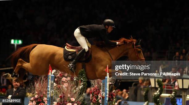 Great Britain's Daniel Neilson riding Varo M competes in the Longines FEI World Cup during day six of The London International Horse Show at the...