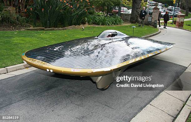 Driven by designer Marcelo da Luz, the Solar XOF1 car arrives during a reception at the official residence of the Consul General of Canada on March...