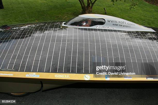 Driven by designer Marcelo da Luz, the Solar XOF1 car arrives during a reception at the official residence of the Consul General of Canada on March...