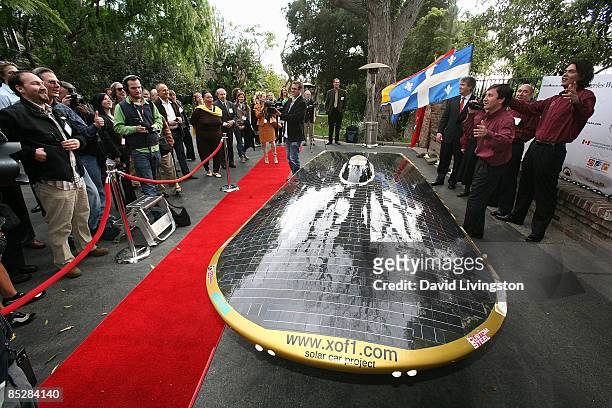 Car designer Marcelo da Luz exhibits his Solar XOF1 during a reception at the official residence of the Consul General of Canada on March 6, 2009 in...