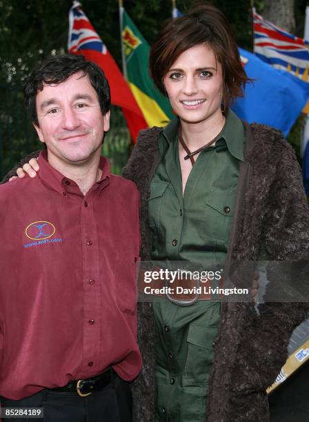 Car designer Marcelo da Luz and actress Stana Katic attend the unveiling of the Solar XOF1 car during a reception at the official residence of the...