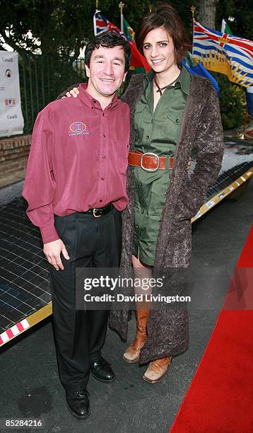 Car designer Marcelo da Luz and actress Stana Katic attend the unveiling of the Solar XOF1 car during a reception at the official residence of the...