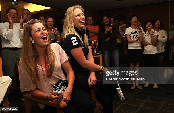 Players Paula Creamer and Morgan Pressel share a laugh alongside players and caddies at the HSBC Women's Champions Caddie of the Year party at the...