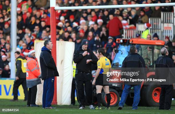 Kick off is delayed after an inflatable rugby ball knocks down the crossbar for the posts before the Aviva Premiership match at the Kingsholm...