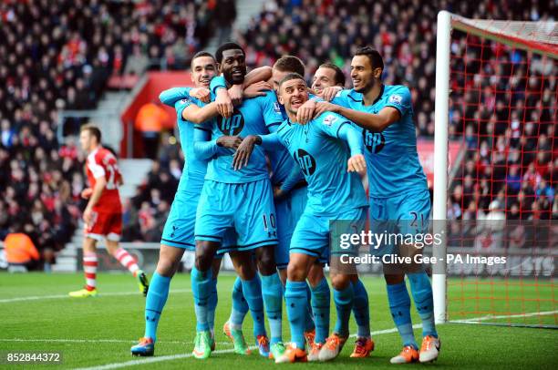 Tottenham Hotspurs's Emmanuel Adebayor celebrates scoring to make the score 3-2 during the Barclays Premier League match at St Marys' Stadium,...