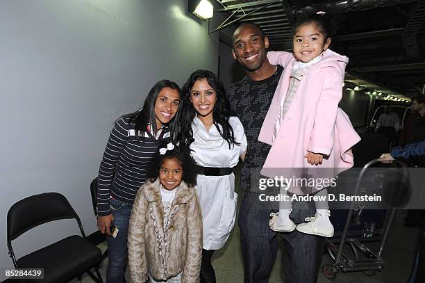 Los Angeles Sol player Marta Viera da Silva poses with Kobe Bryant of the Los Angeles Lakers and his wife Vanessa, and their daughters Natalia and...