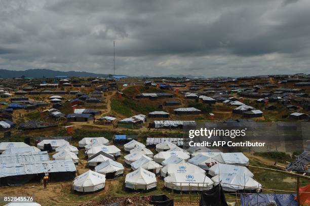 General view shows tents Rohingya refugees and UN Refugee Agency tents at the Kutupalong refugee camp on September 24, 2017. Nearly 430,000 refugees...