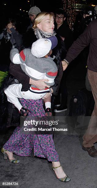 Madonna and son David Banda attend Kaballah services in Manhattan on March 6, 2009 in New York City.