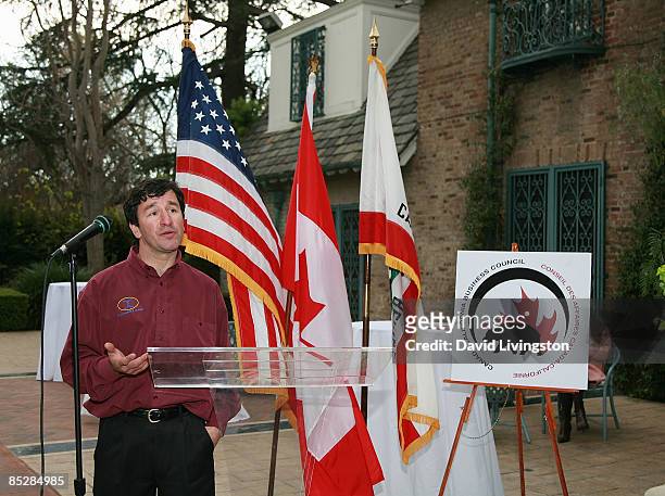 Car designer Marcelo da Luz speaks at the unveiling of his Solar XOF1 vehicle during a reception at the official residence of the Consul General of...