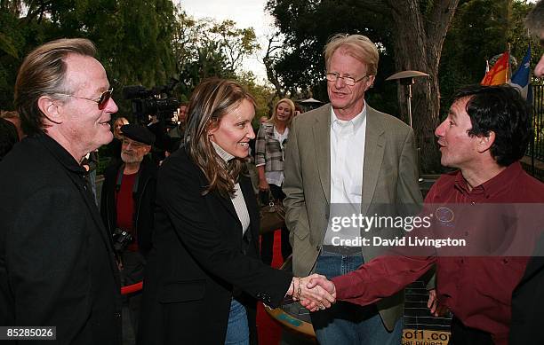 Actor Peter Fonda, his girlfriend Parky DeVogelaere, actor Ed Begley Jr. And car designer Marcelo da Luz attend the unveiling of the Solar XOF1...