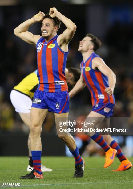 Hugh Sandilands of Port Melbourne celebrates the win after Ben Lennon of the Tigers missed a kick for goal that could have won Richmond the match...