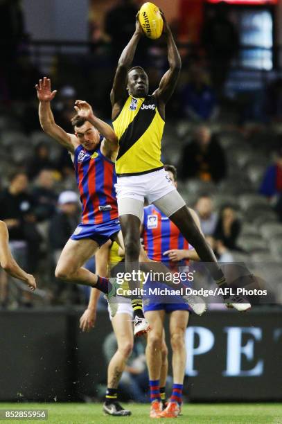 Mabior Chol of the Tigers marks the ball during the VFL Grand Final match between Richmond and Port Melbourne at Etihad Stadium on September 24, 2017...