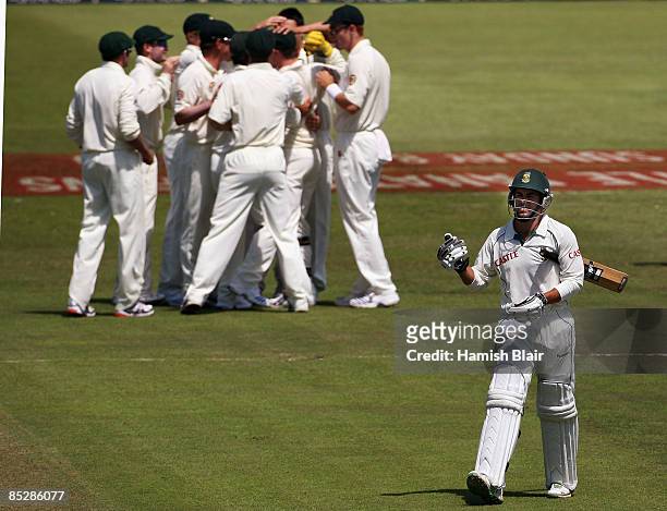 Neil McKenzie of South Africa leaves the field after being dismissed during day two of the Second Test between South Africa and Australia played at...