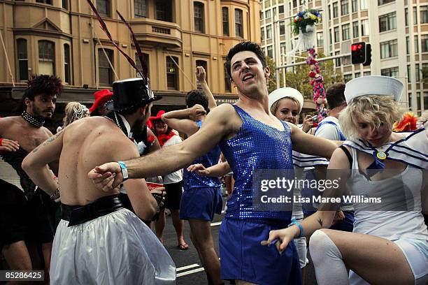 Parade goers dance prior to the annual Sydney Gay and Lesbian Mardi Gras Parade on Oxford Street on March 7, 2009 in Sydney, Australia. The annual...