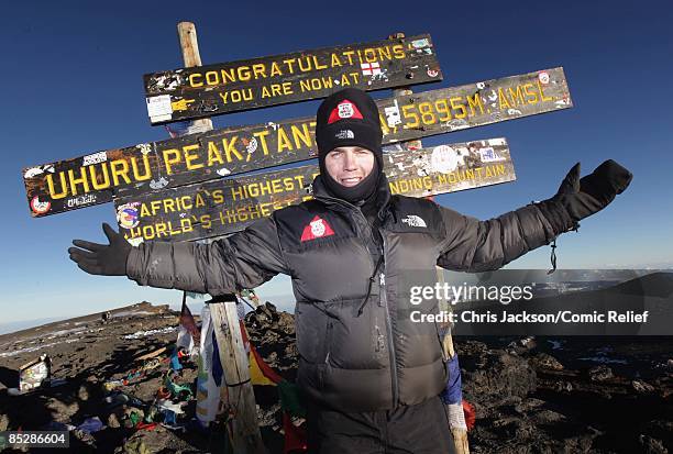 Gary Barlow reaches the top of Mount Kilimanjaro on the seventh day of The BT Red Nose Climb of Kilimanjaro on March 7, 2009 in Arusha, Tanzania....