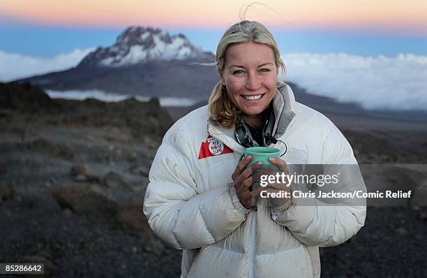 Denise Van Outen drinks a hot chocolate on the seventh day of The BT Red Nose Climb of Kilimanjaro on March 7, 2009 in Arusha, Tanzania. Celebrities...